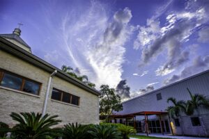 Cloudy sky above two buildings